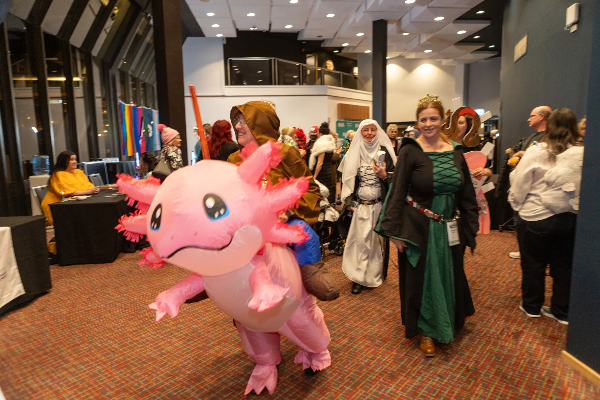 People wearing costumes at the romance writers of australia welcome cocktail party