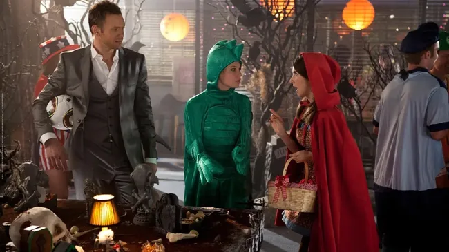 Community, Epidemiology halloween episode. Three people dressed as a soccer player, a dinosaur, and little red riding hood.