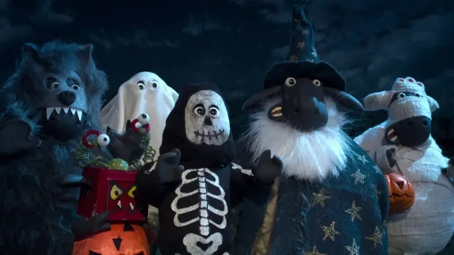 Shaun the Sheep tv episode still. Six characters dressed in costumes.