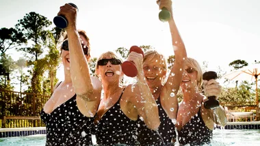 four women doing Aqua Aerobics