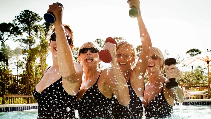 four women doing Aqua Aerobics