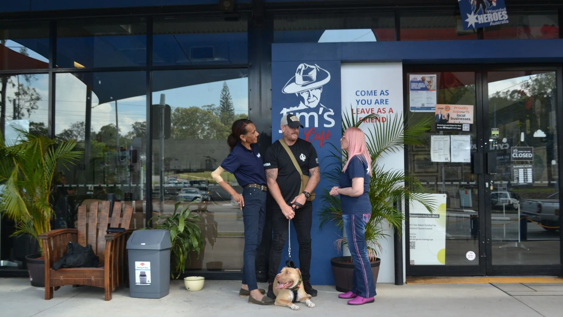Wounded Heroes Store front with veteran and volunteers