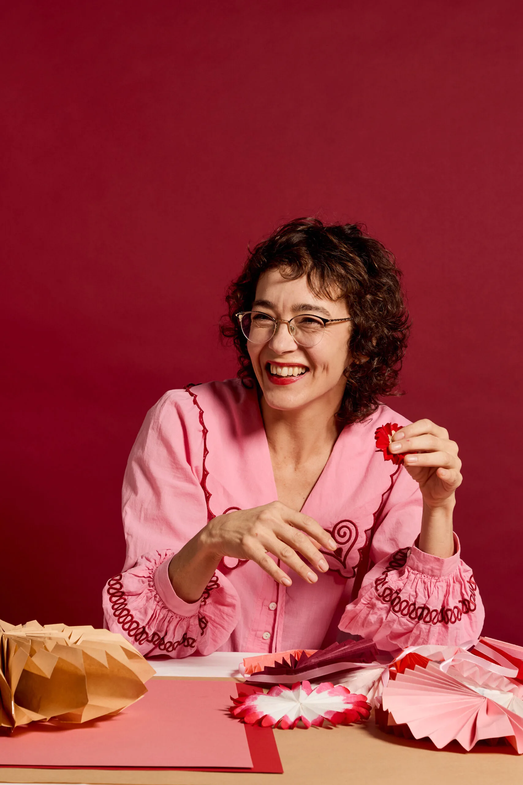 Susie Rugg with paper garlands photography by Lauren Trompp