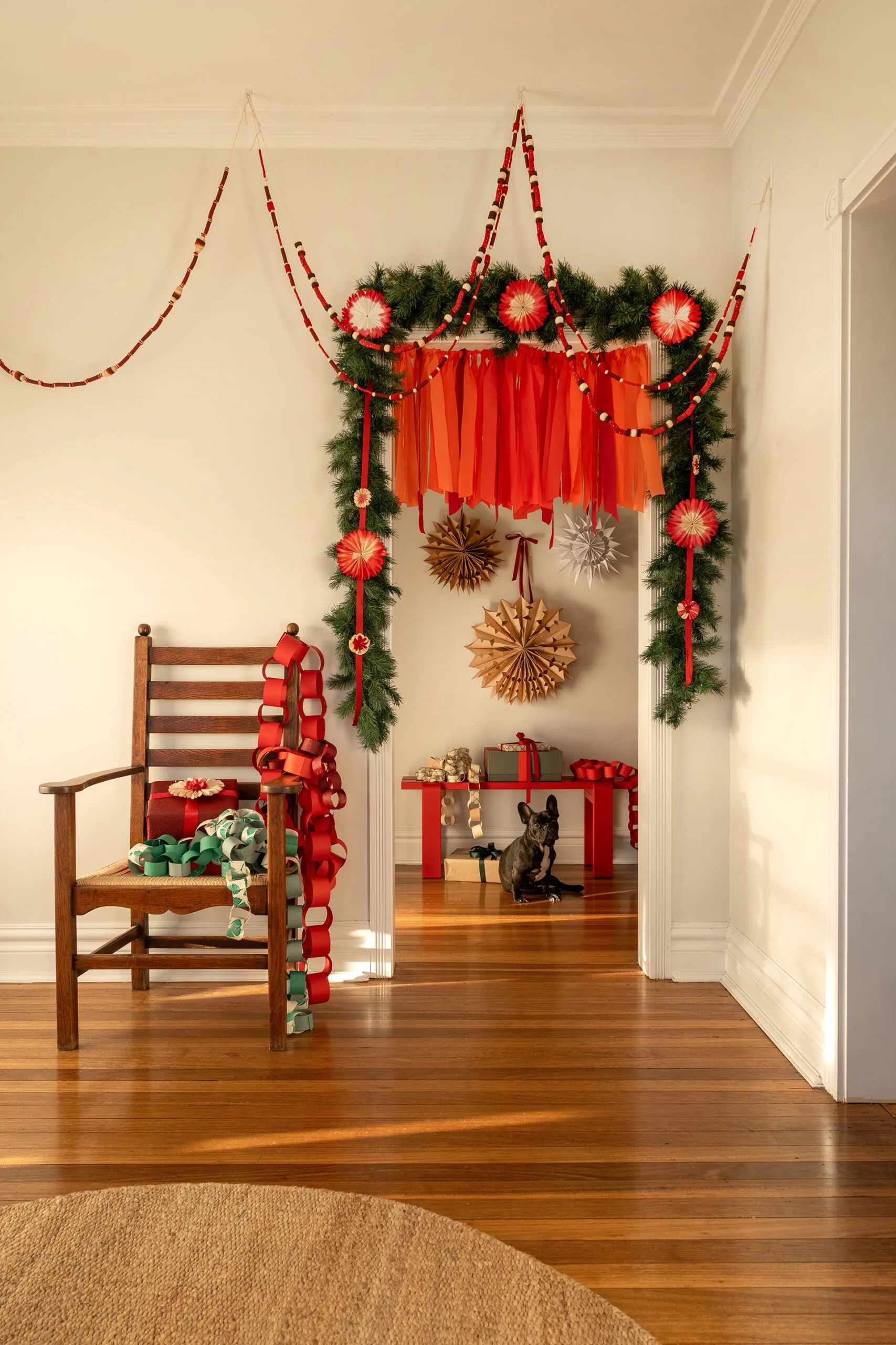 Pasta garlands hung in living room.Photography by Giuseppe Santamaria