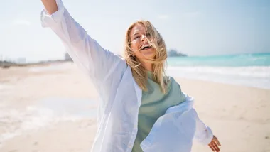Woman happy beach