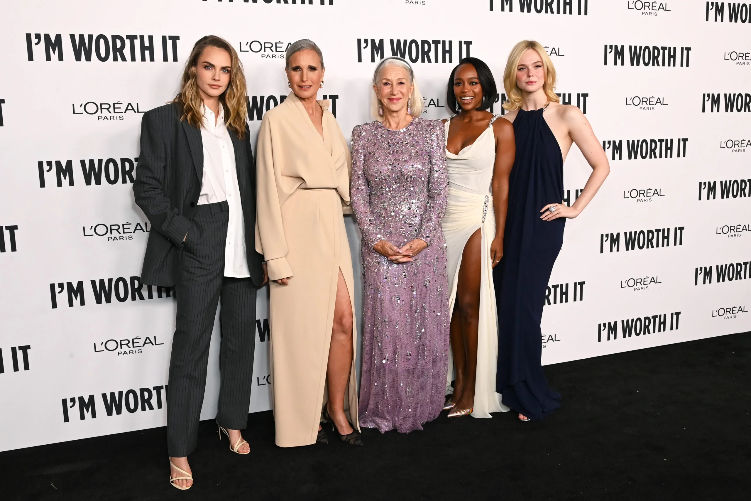 HOLLYWOOD, CALIFORNIA - NOVEMBER 21: (L-R) Cara Delevingne, Andie MacDowell, Helen Mirren, Aja Naomi King and Elle Fanning attend the 19th annual L'Or&eacute;al Paris Women of Worth Celebration at NeueHouse Hollywood on November 21, 2024 in Hollywood, California. (Photo by Jon Kopaloff/Getty Images)