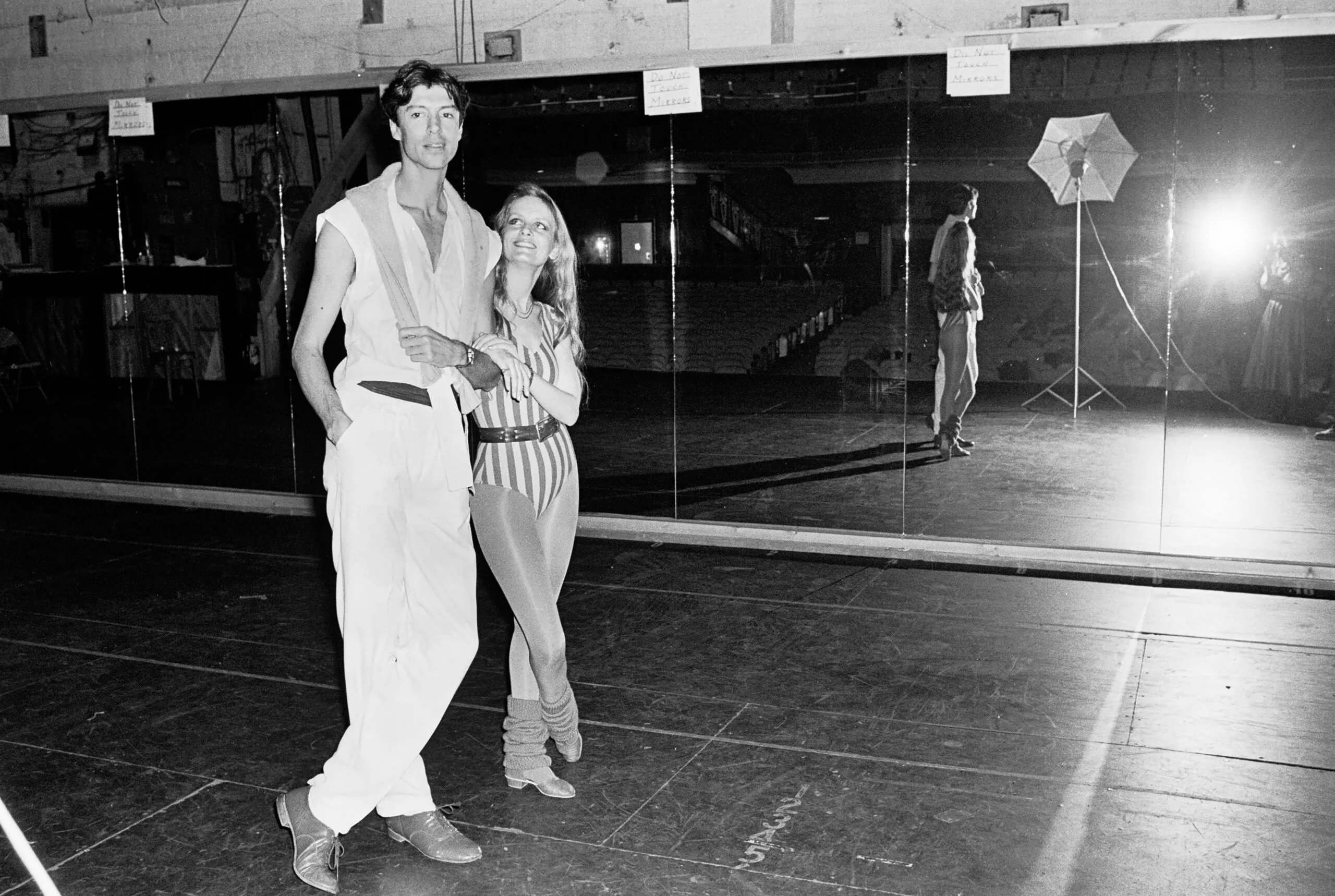 View of American dancer & choreographer Tommy Tune (left) and British dancer & model Twiggy (born Lesley Hornby, later Dame Lesley Lawson) during a press call at the St James Theater, New York, New York, January 13, 1983. They were there to rehearse for a production of the musical 'My One and Only' (by Peter Stone, Timothy Mayer, and George & Ira Gershwin), which opened on May 1, 1986. (Photo by Gary Gershoff/Getty Images)