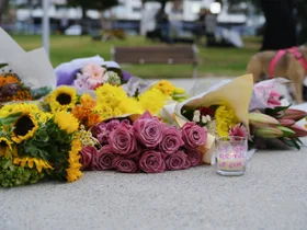 Bondi Beach falls silent in grief