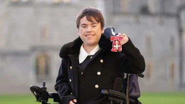 Inspiring 11-year-old girl awarded the MBE medal from Prince William 