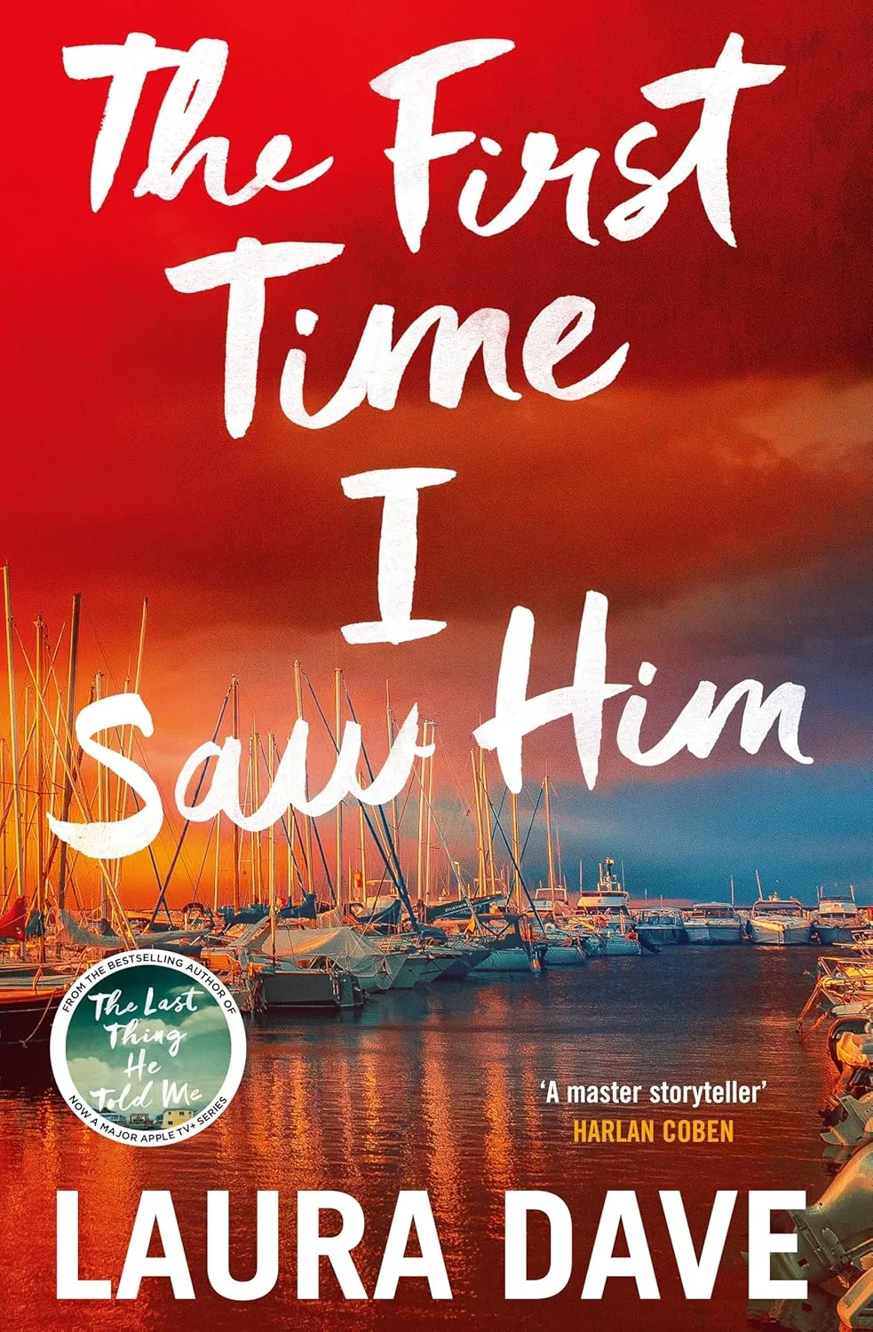 Book cover The First Time I Saw him. A harbour with boats moored beneath a red, cloudy sky.
