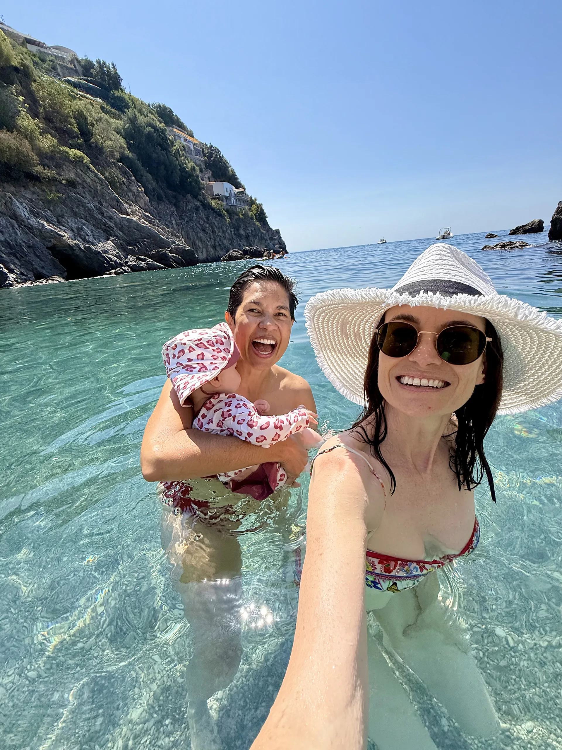 Narelda Jaocbs and Karina Natt taking a dip with baby Sanna. Photo provided.