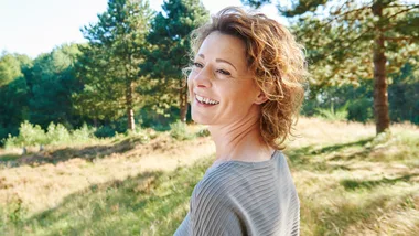 Mature happy woman outdoors