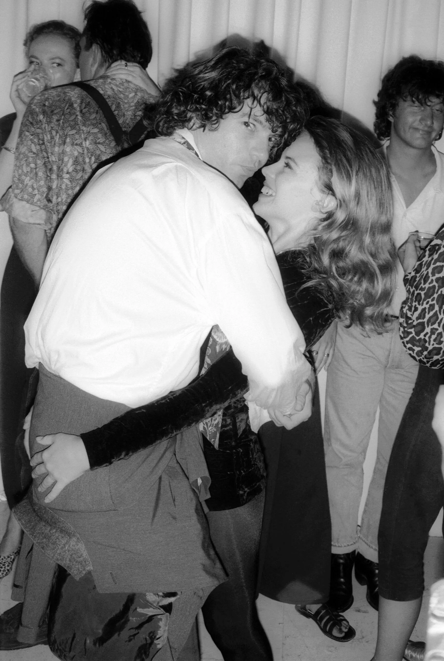 SYDNEY, AUSTRALIA - JANUARY 22: (L-R) Australian singer Michael Hutchence with Kylie Minogue at a party to celebrate Michael's 30th birthday on January 22, 1990 in Sydney, Australia. (Photo by Peter Carrette Archive/Getty Images) 