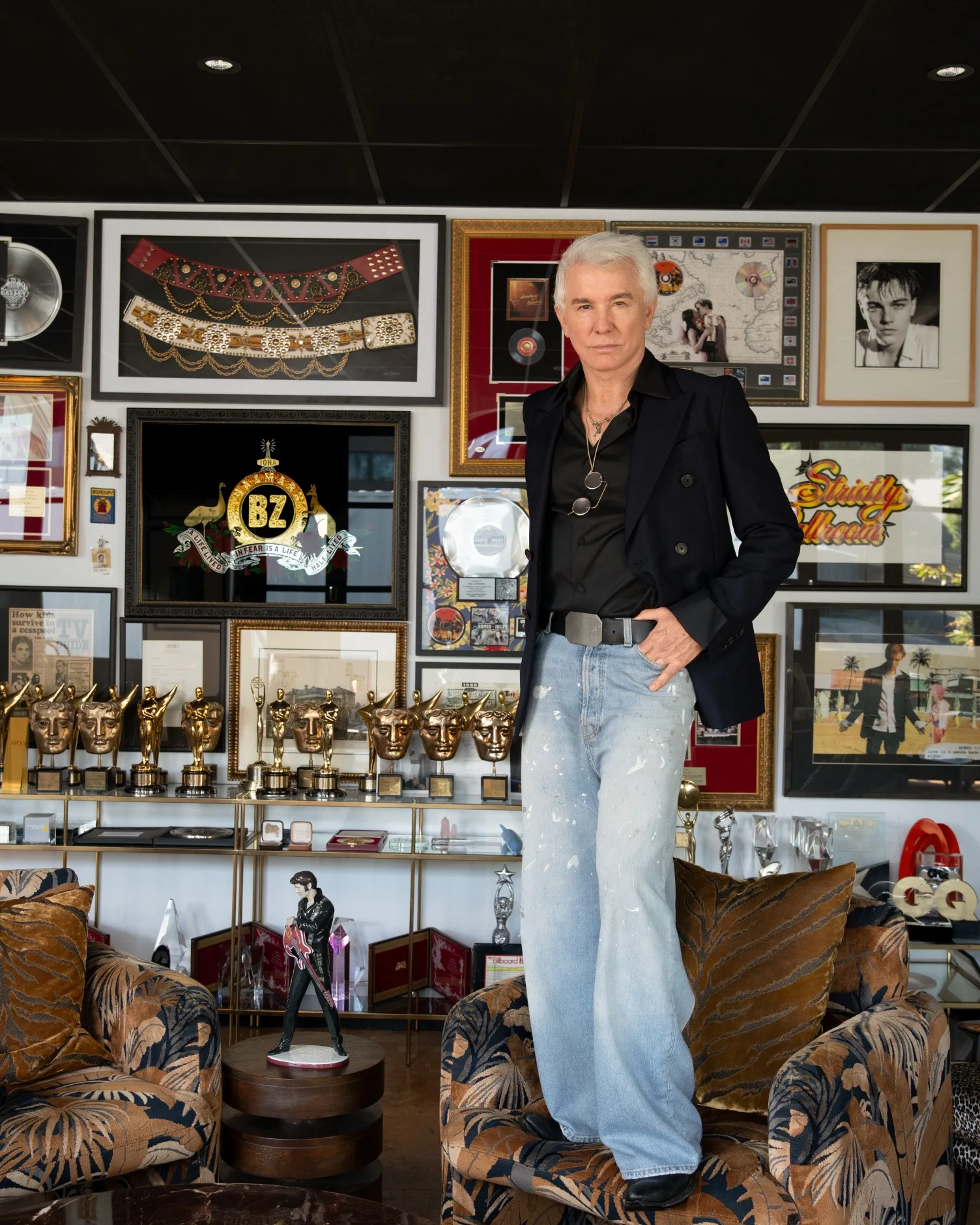 Baz Luhrmann in  his studio surrounded by Elvis Presley memorabilia. Photo supplied.