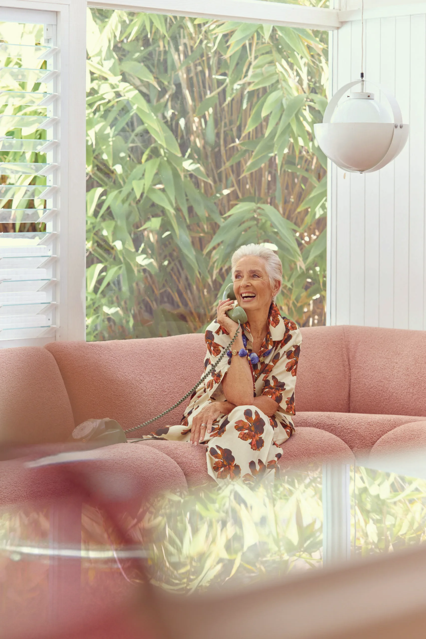 Model Robyn Kemp answerin ga phone. Photography by Alana Landsberry. Styling by Mattie Cronan.