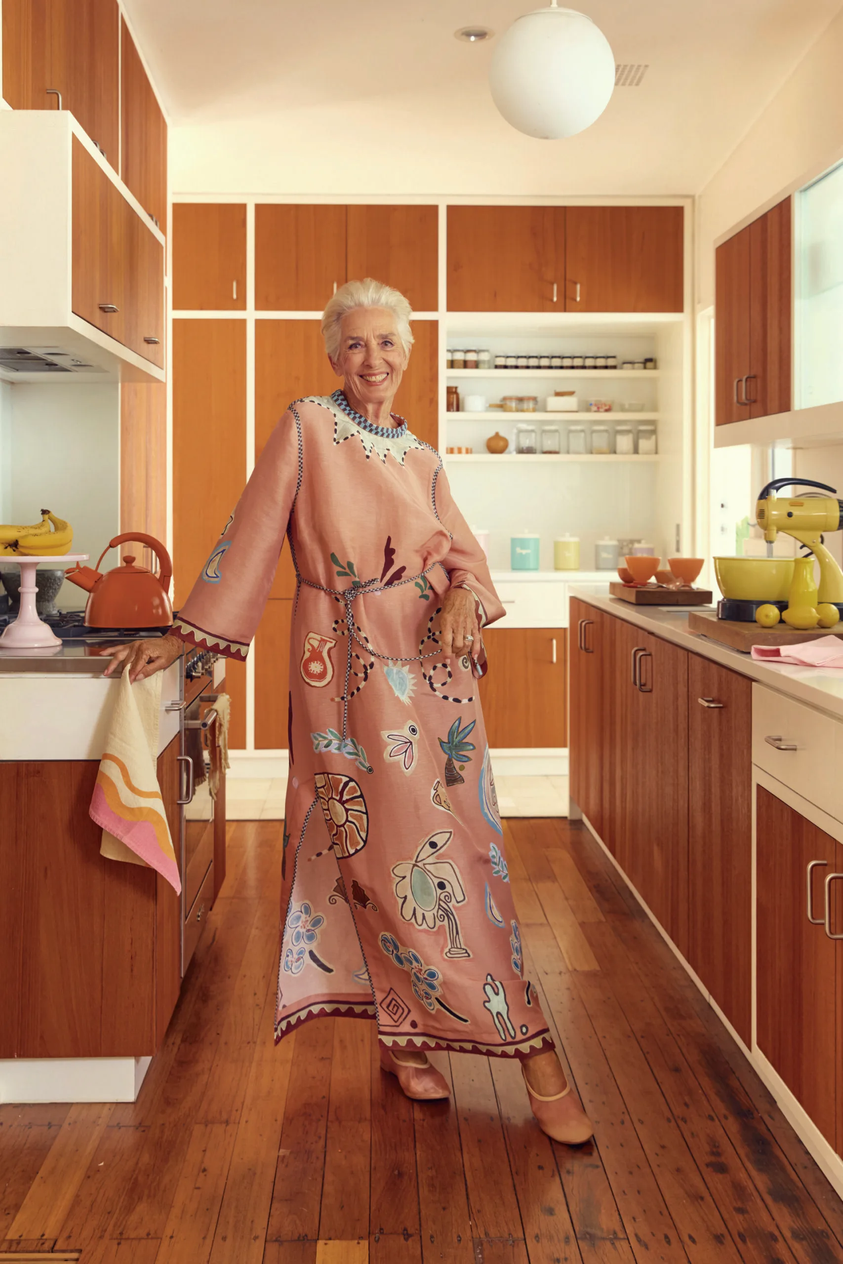 Robyn Kemp posing for a photo in the kitchen. Photography by Alana Landsberry. Styling by Mattie Cronan.
