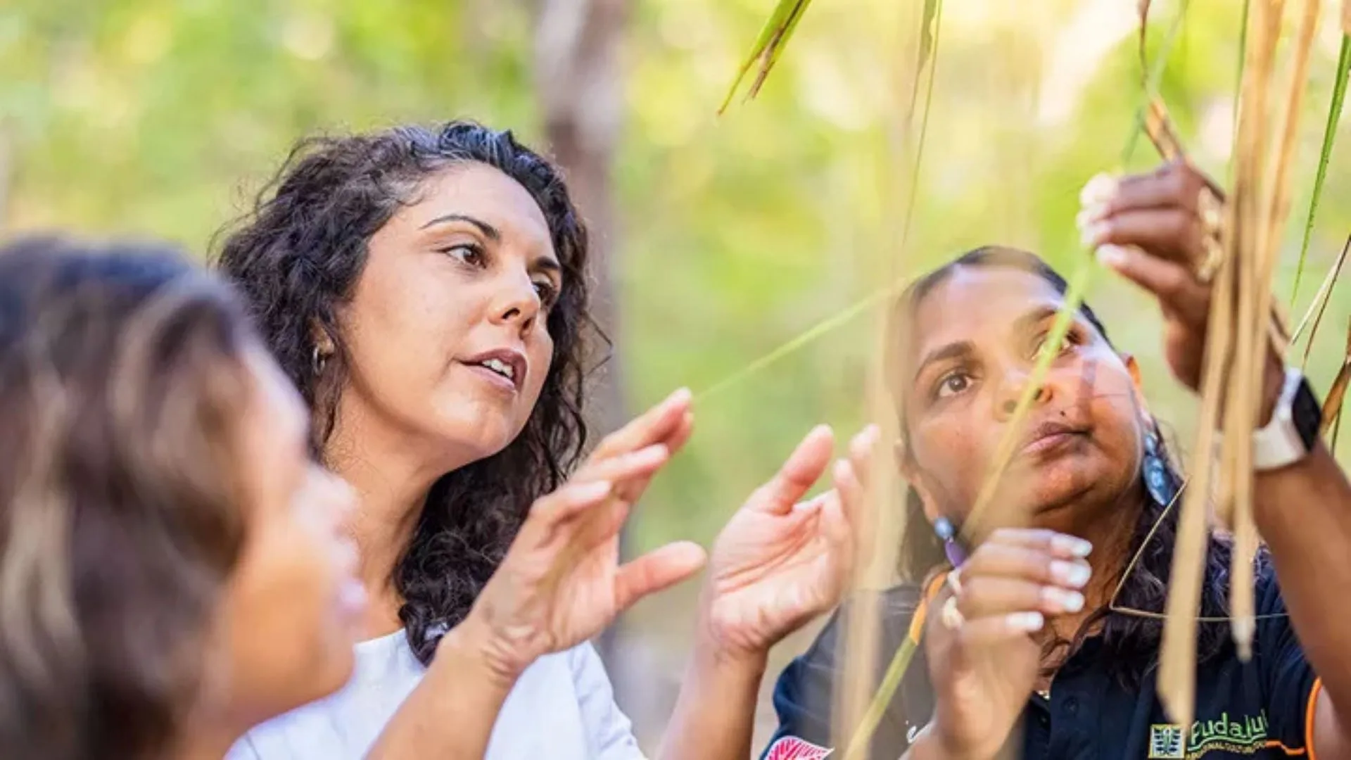 female tour guide explaining the land during a small group tour, northern territory 