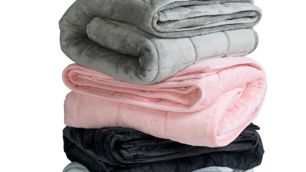 The Oodie weighted blanket - grey, pink and black colours
