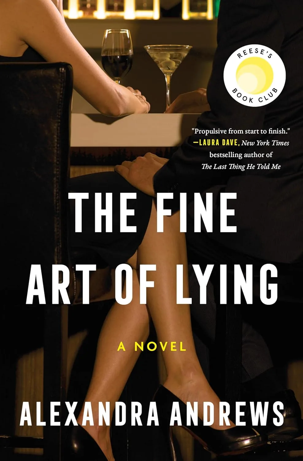 Book cover of The Fine Art of Lying with a photo of a man and woman sitting at a table with drinks. He has his hand on her knee.