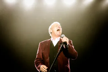 John Farnham is putting down the mic for good