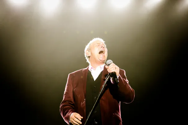 John Farnham is putting down the mic for good