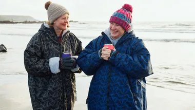 women laughing in winter