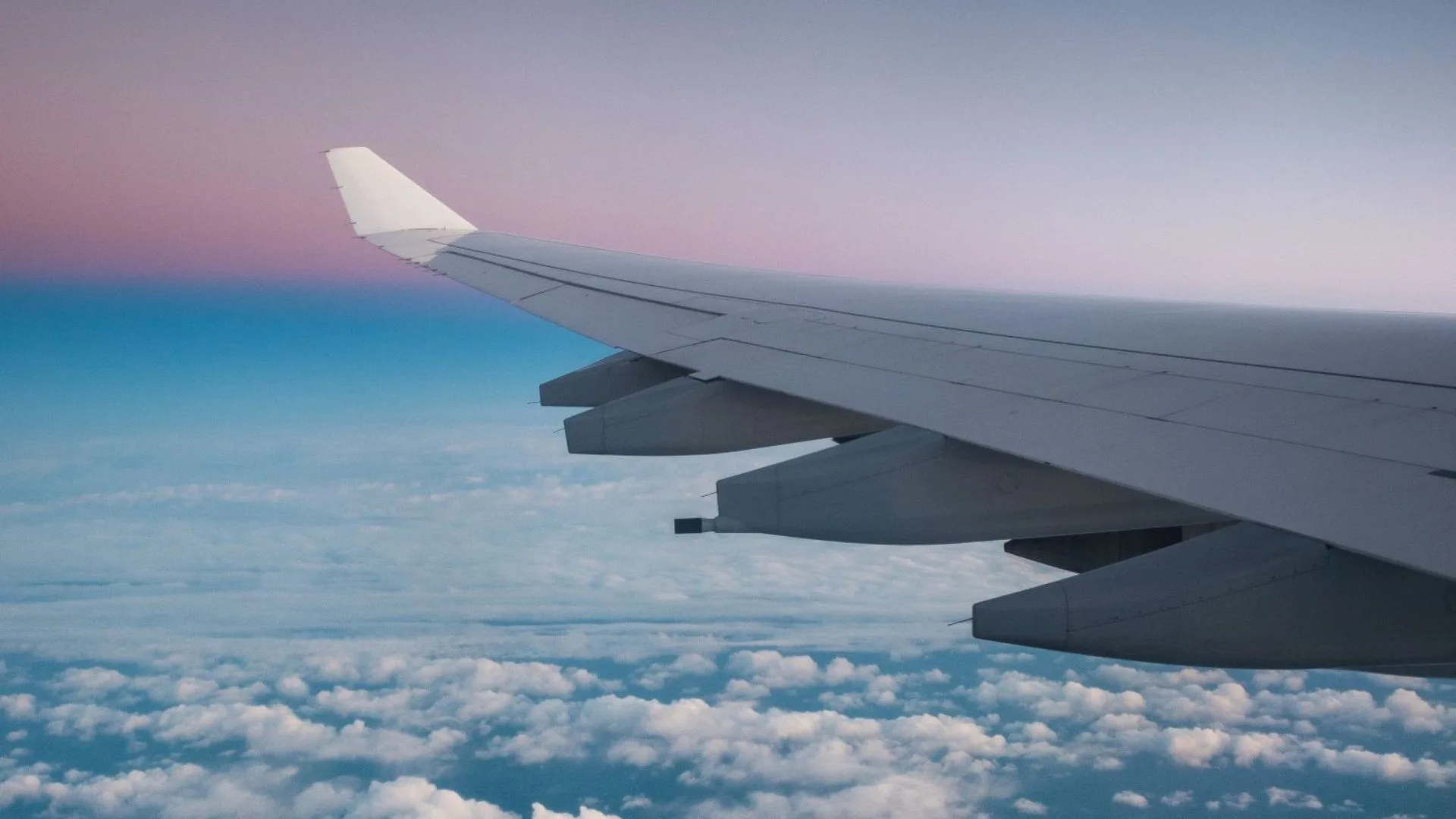 Tangerine international roaming - plane flying through sky