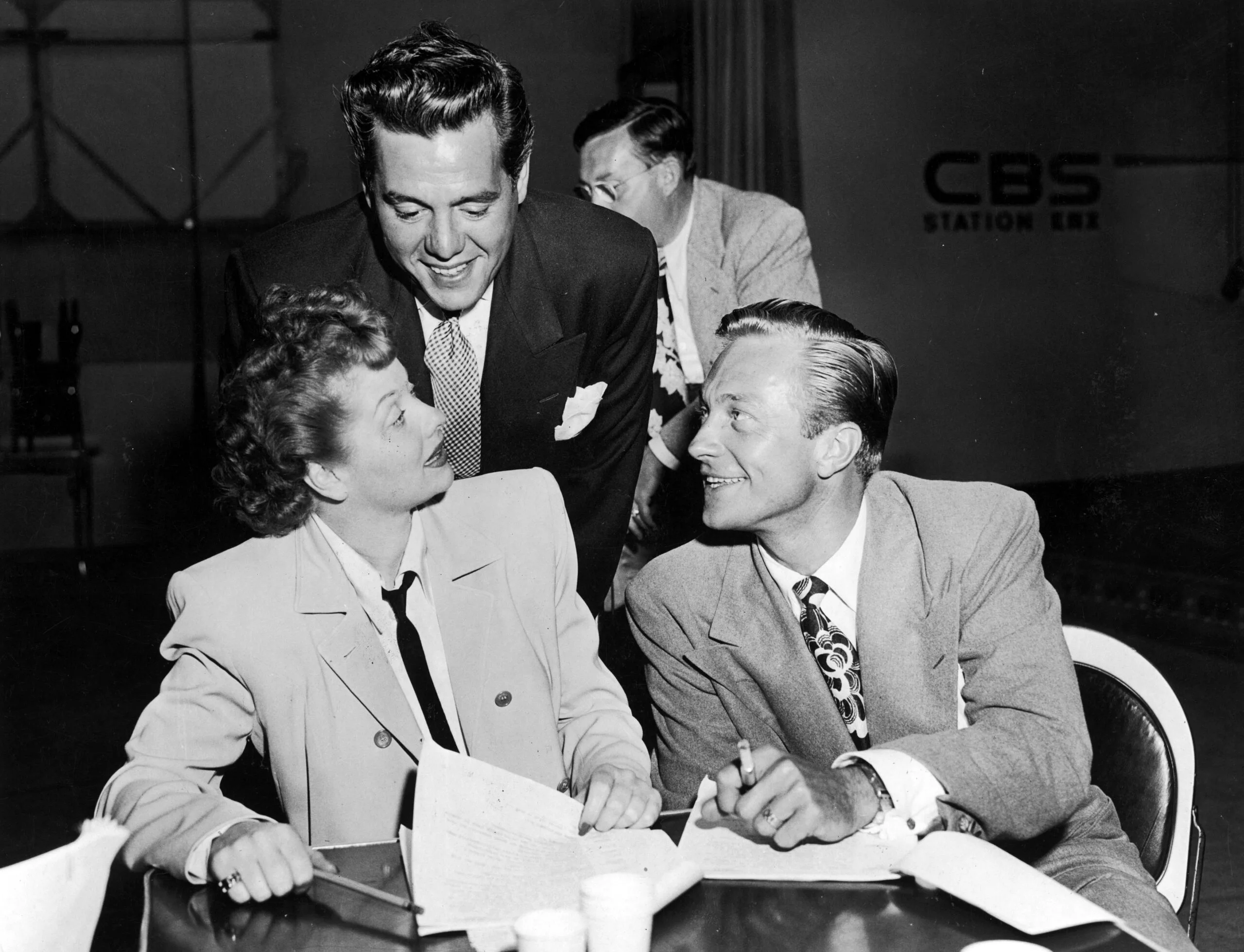 American actress Lucille Ball (1911 - 1989) during a rehearsal for the CBS radio show 'My Favourite Husband', with co-star Richard Denning (1914 - 1998, right) and real-life husband Desi Arnaz (1917 - 1986), circa 1948. (Photo by Pictorial Parade/Archive Photos/Getty Images)