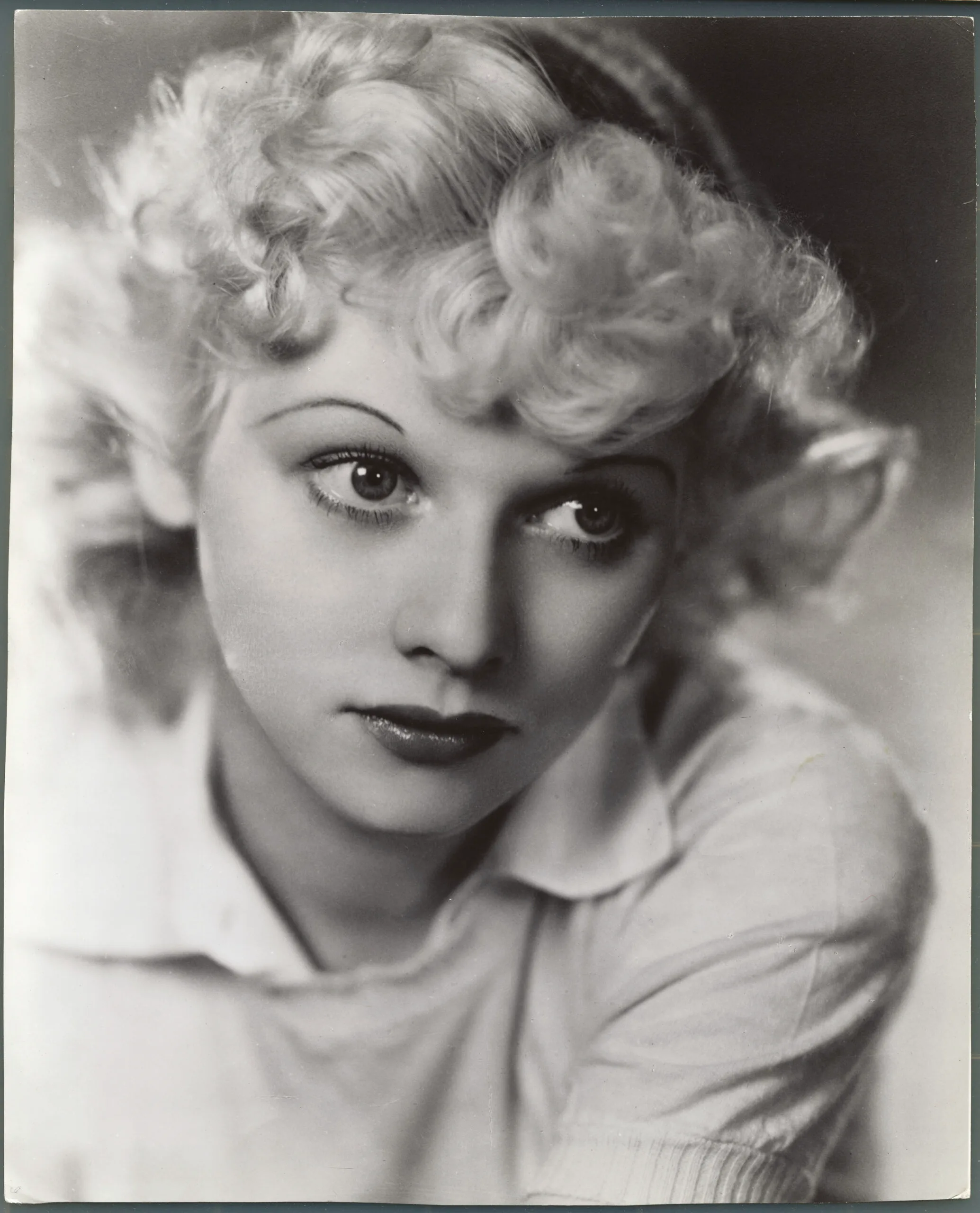 (Original Caption) Lucille Ball, Hollywood's glamorous redheaded star of three triumphant pictures in less than a year, Du Barry Was a Lady, Best Foot Forward, and Meet the People, gave evidence of her promising future during her earliest years. In that year, Lucille received her first Hollywood opportunity. She played a showgirl part in Eddie Cantor's Roman Sandals, then went on to appear in dozens more, always in minor parts. She called herself "Queen of the B's" until 1942, when she joined Metro-Goldwyn-Mayer to star in Du Barry Was A Lady. Her position was secure from that moment. She next starred in Best Foot Forward, following in the recent Meet the People with Dick Powell. Immediately on completion of the latter, Miss Ball joined the Hollywood Cavalcade for a national tour on behalf of the Third War Loan. On returning to Hollywood, she found a new long-term cont (Photo by George Rinhart/Corbis via Getty Images)