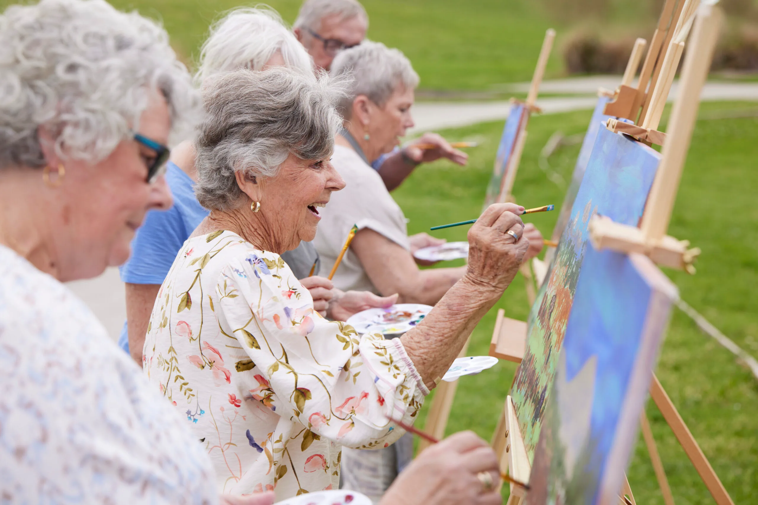 women painting in retirement