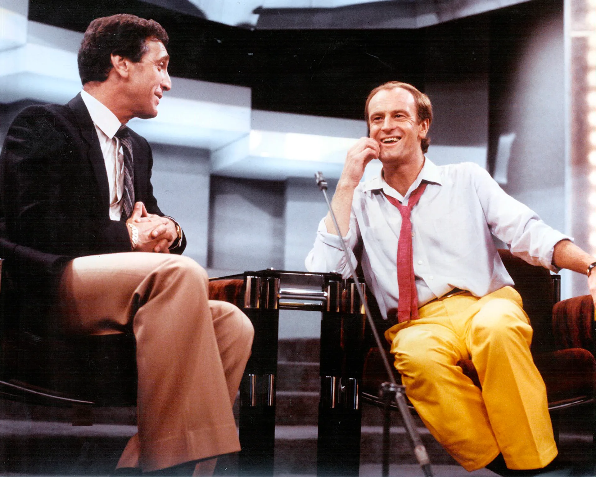 Done Lane with Peter Allen on the set of his show.
