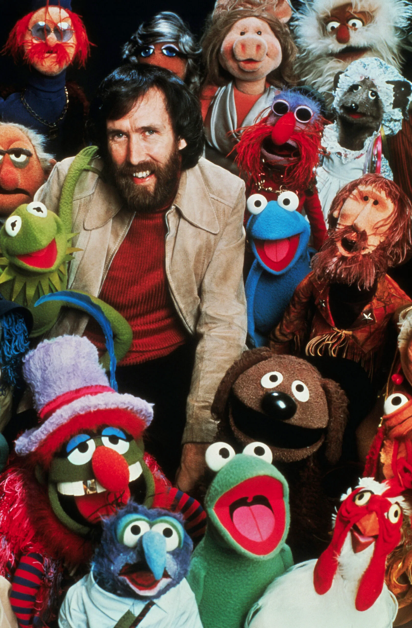 American puppeteer, creator of the Muppets and motion pictures, Jim Henson, poses with his creation characters in The Muppets TV show. Photo: Getty Images