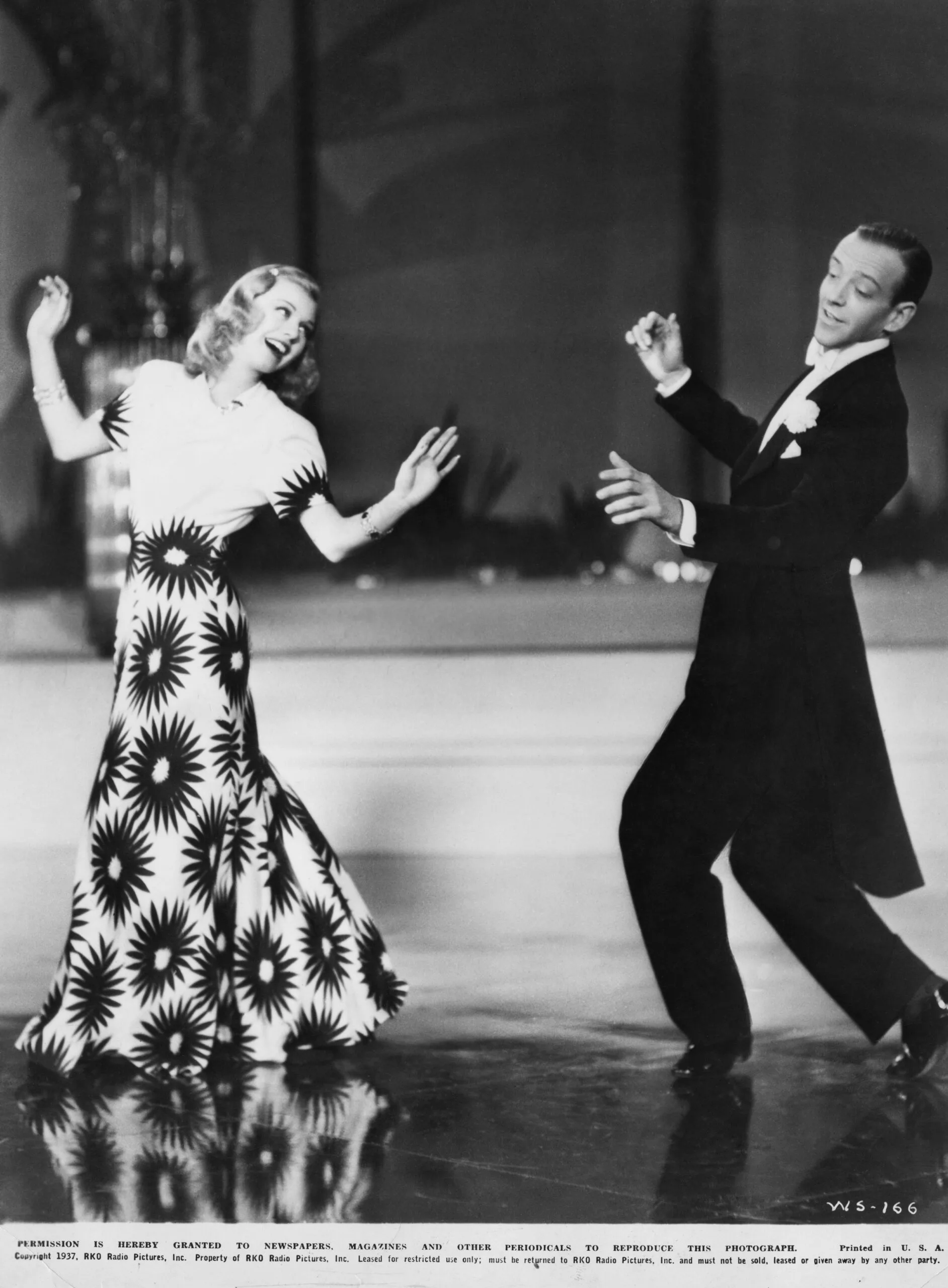American dancers, singers and actors Ginger Rogers (1911 -1995) and Fred Astaire (1899 - 1987) dancing in a scene from 'Shall We Dance', directed by, Mark Sandrich, 1937. (Photo by RKO/Archive Photos/Getty Images)