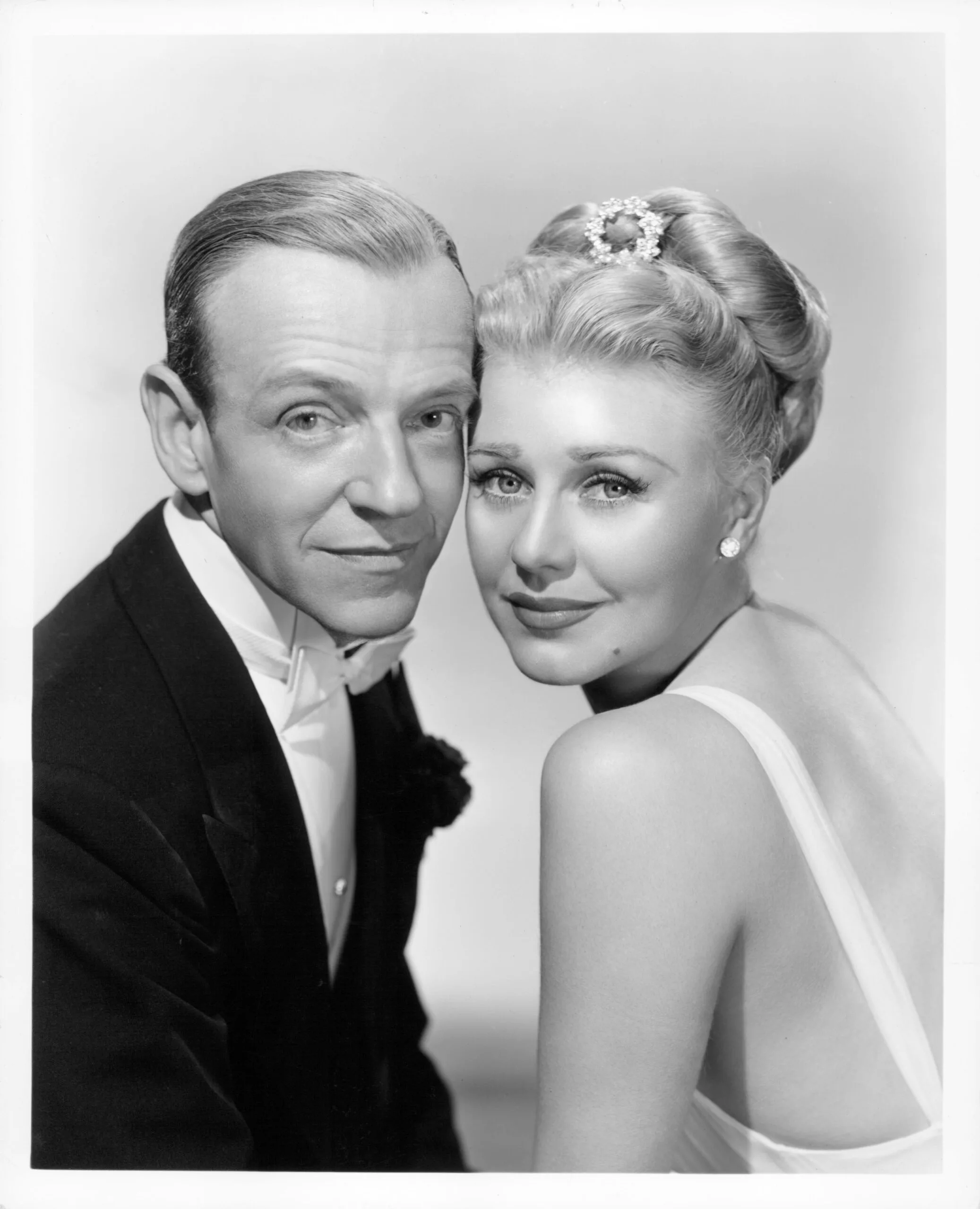 Fred Astaire and Ginger Rogers pose in a scene from the film 'The Barkleys Of Broadway', 1949. (Photo by Metro-Goldwyn-Mayer/Getty Images)