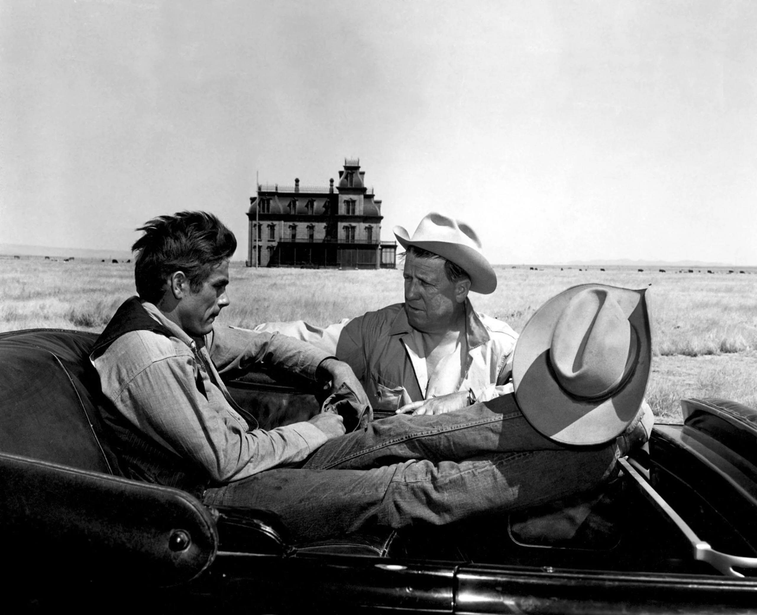 George Stevens and James Dean on the set of "Giant". (Photo by Sunset Boulevard/Corbis via Getty Images)