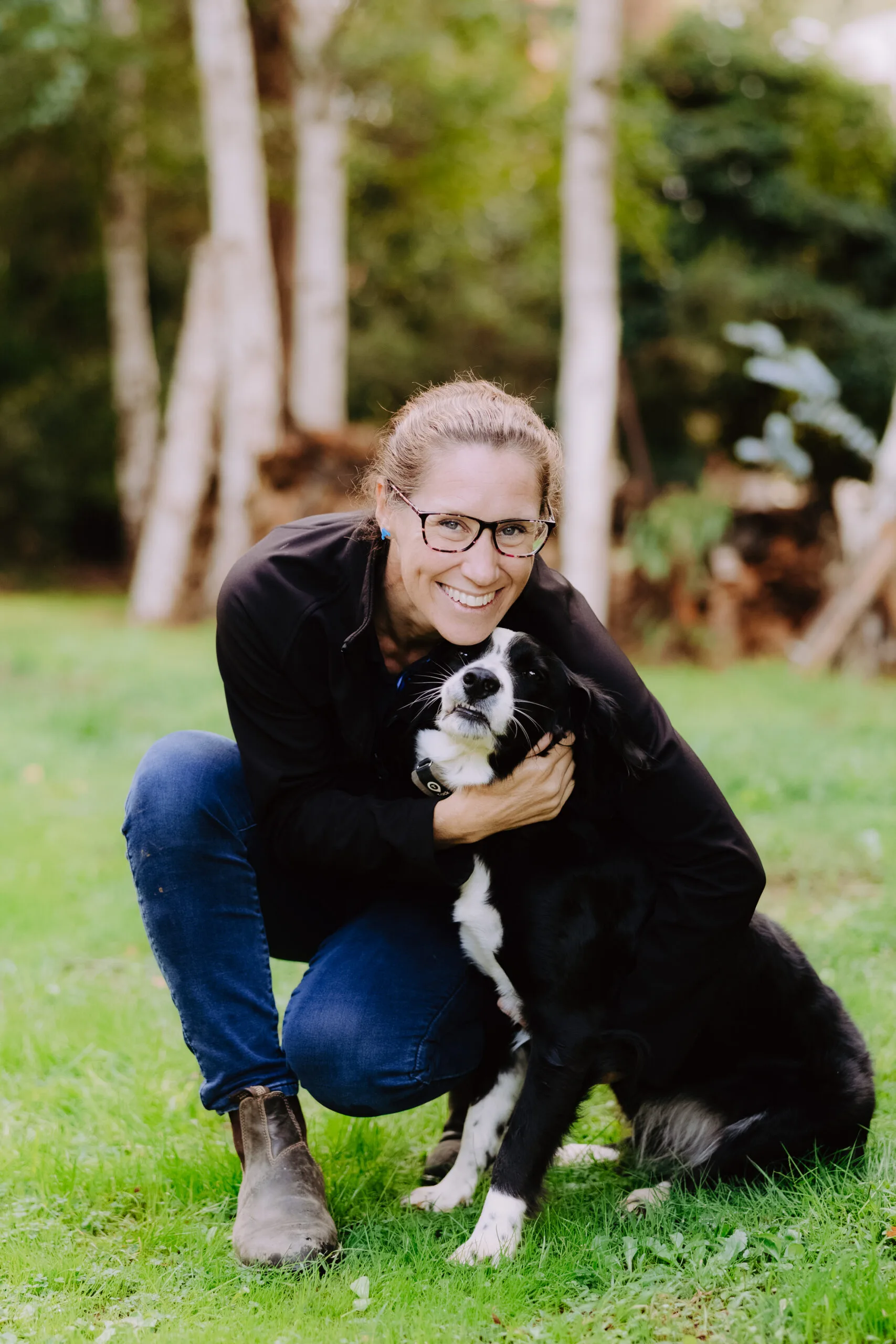 Becky hugs her cattle dog.