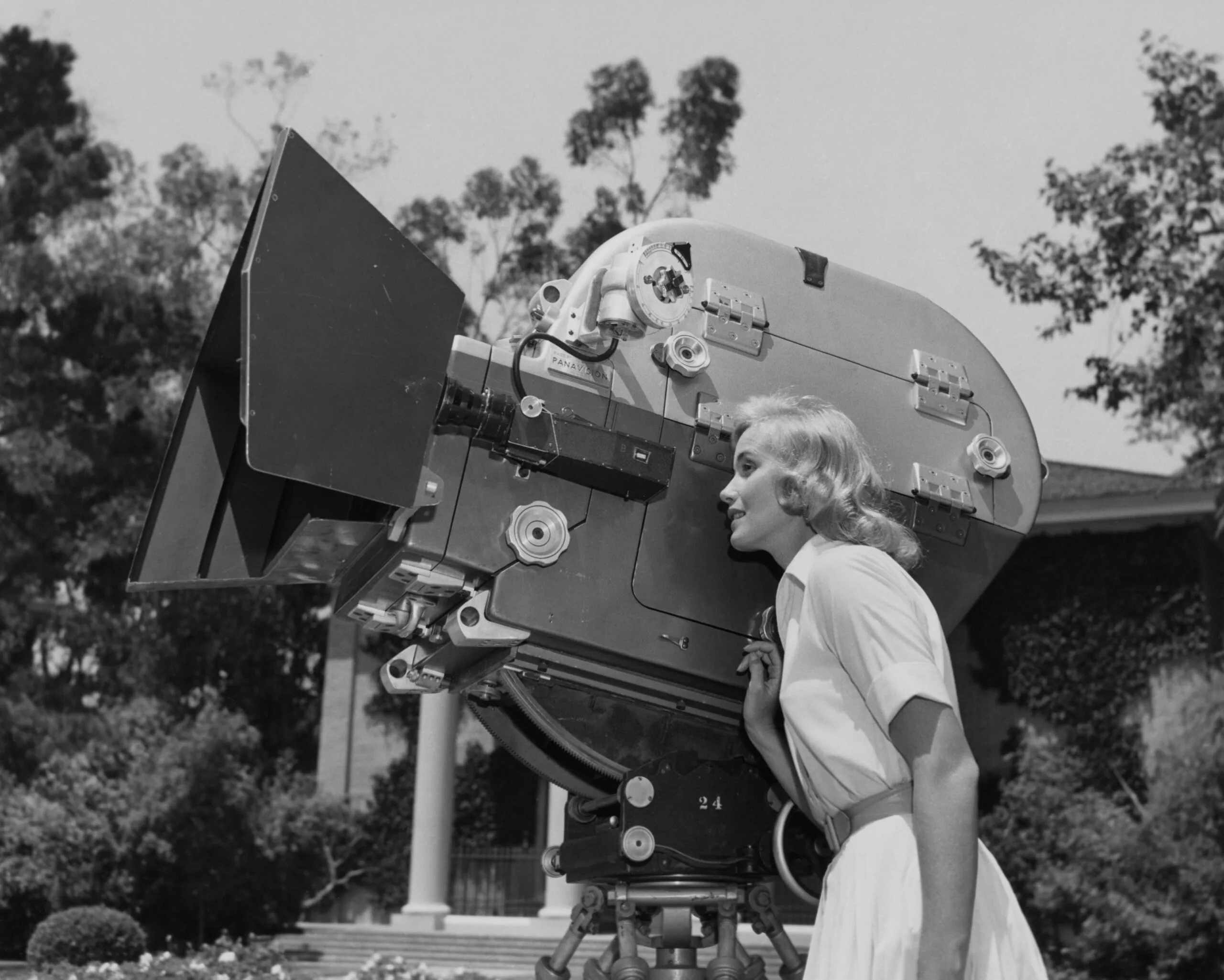 American actress Eva Marie Saint peering though the viewfinder of an MGM Camera 65 on the set of the historical romance 'Raintree County', 1957. The film, the first to use the camera, saw Saint play Nell Gaither in the adaption of the novel by Ross Lockridge Jr, directed by Edward Dmytryk. (Photo by Archive Photos/Getty Images)
