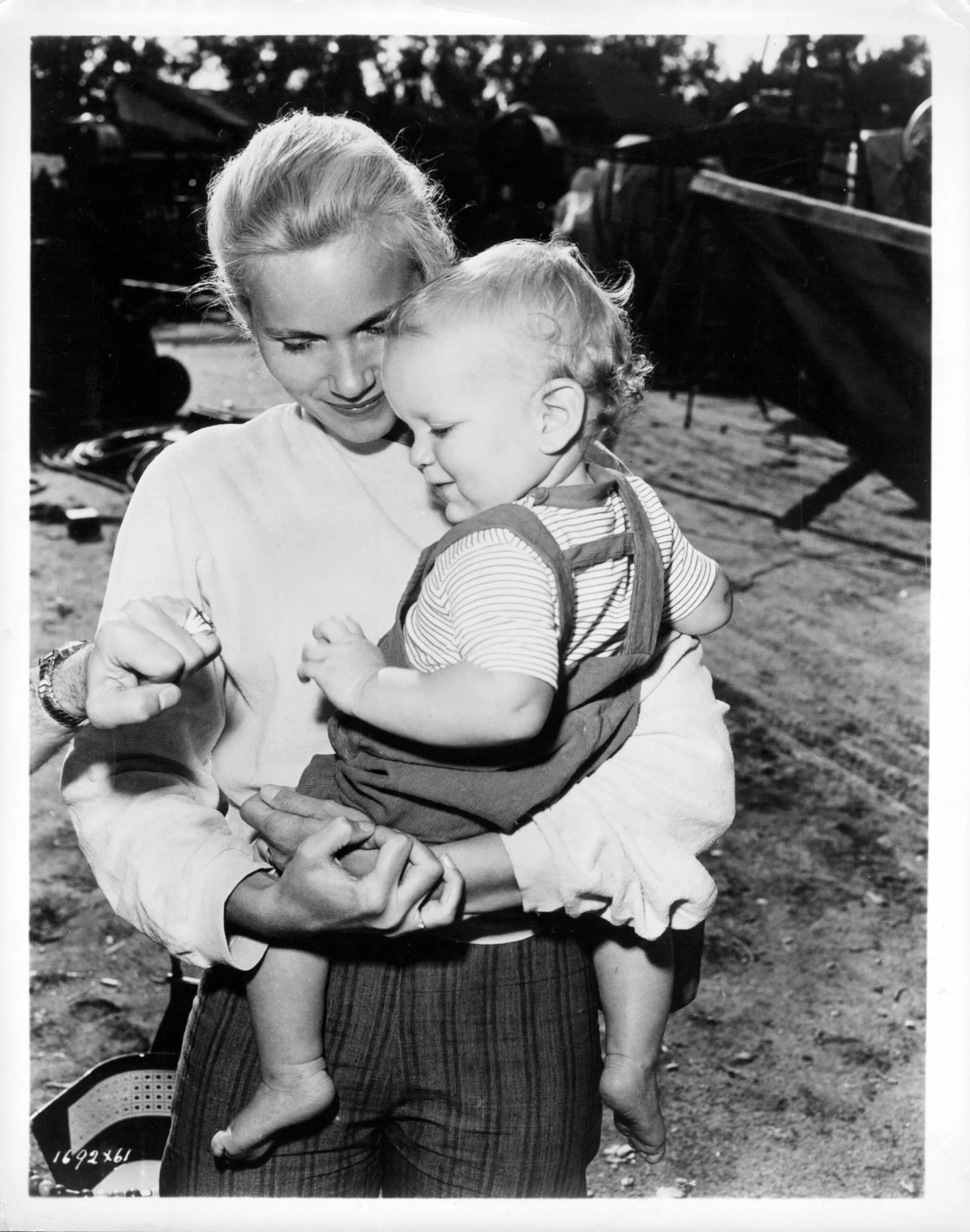 Eva Marie Saint holding son Darrell in publicity portrait for the film 'Raintree County', 1957. (Photo by Metro-Goldwyn-Mayer/Getty Images)