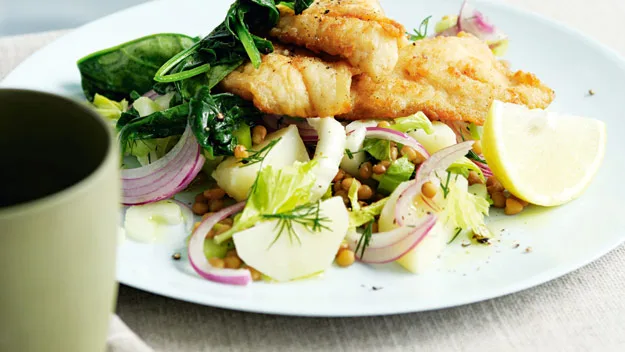 Fish with potato and lentil salad
