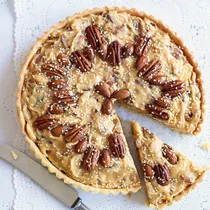 Julie Goodwin sweetened condensed milk tart topped with nuts