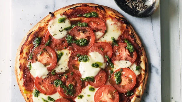 Tomato, pesto and bocconcini pizza