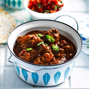 julie goodwin chilli beef hot pot in a blue and white saucepan