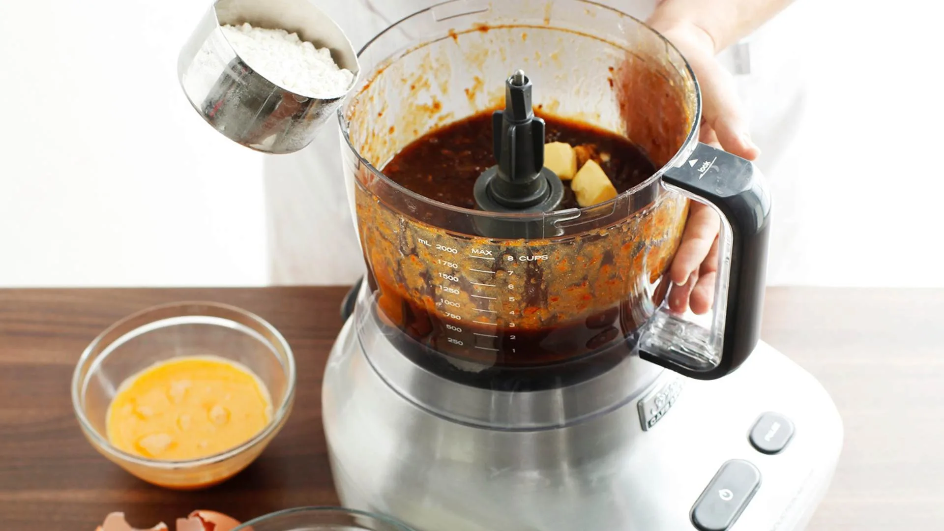 Blend or process date mixture with butter and sugar until puréed