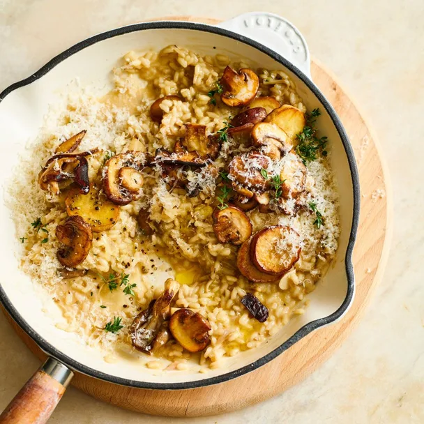 mushroom risotto recipes with parmesan in a white pan