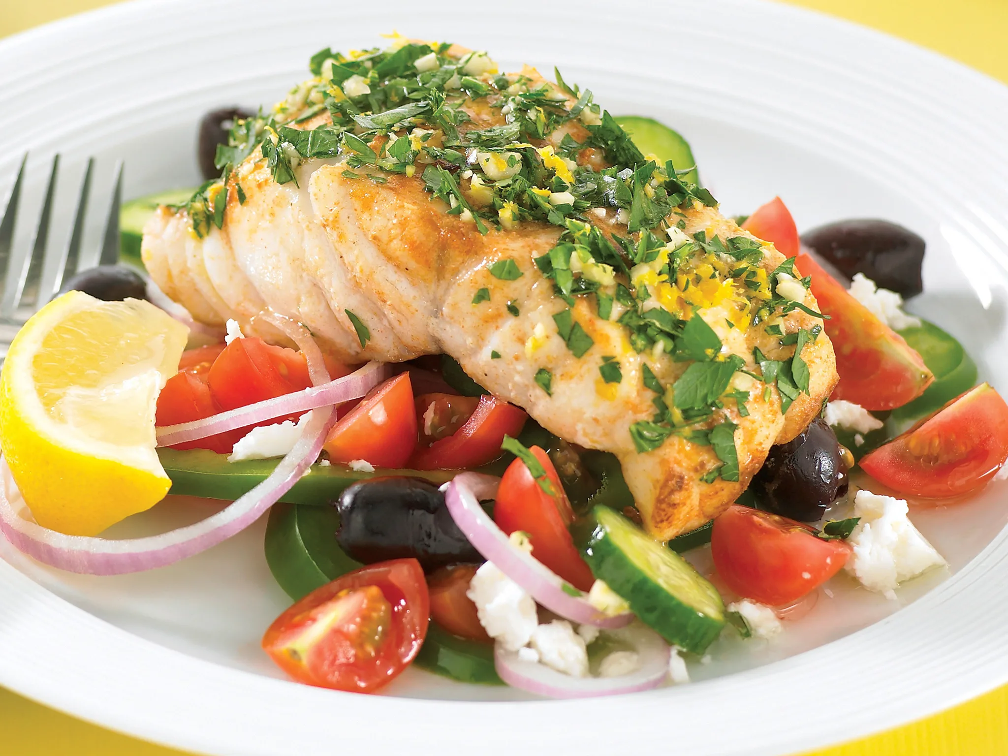 Lemon parsley fish with greek salad