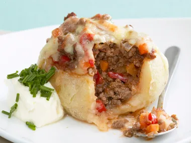 bolognese-stuffed potatoes