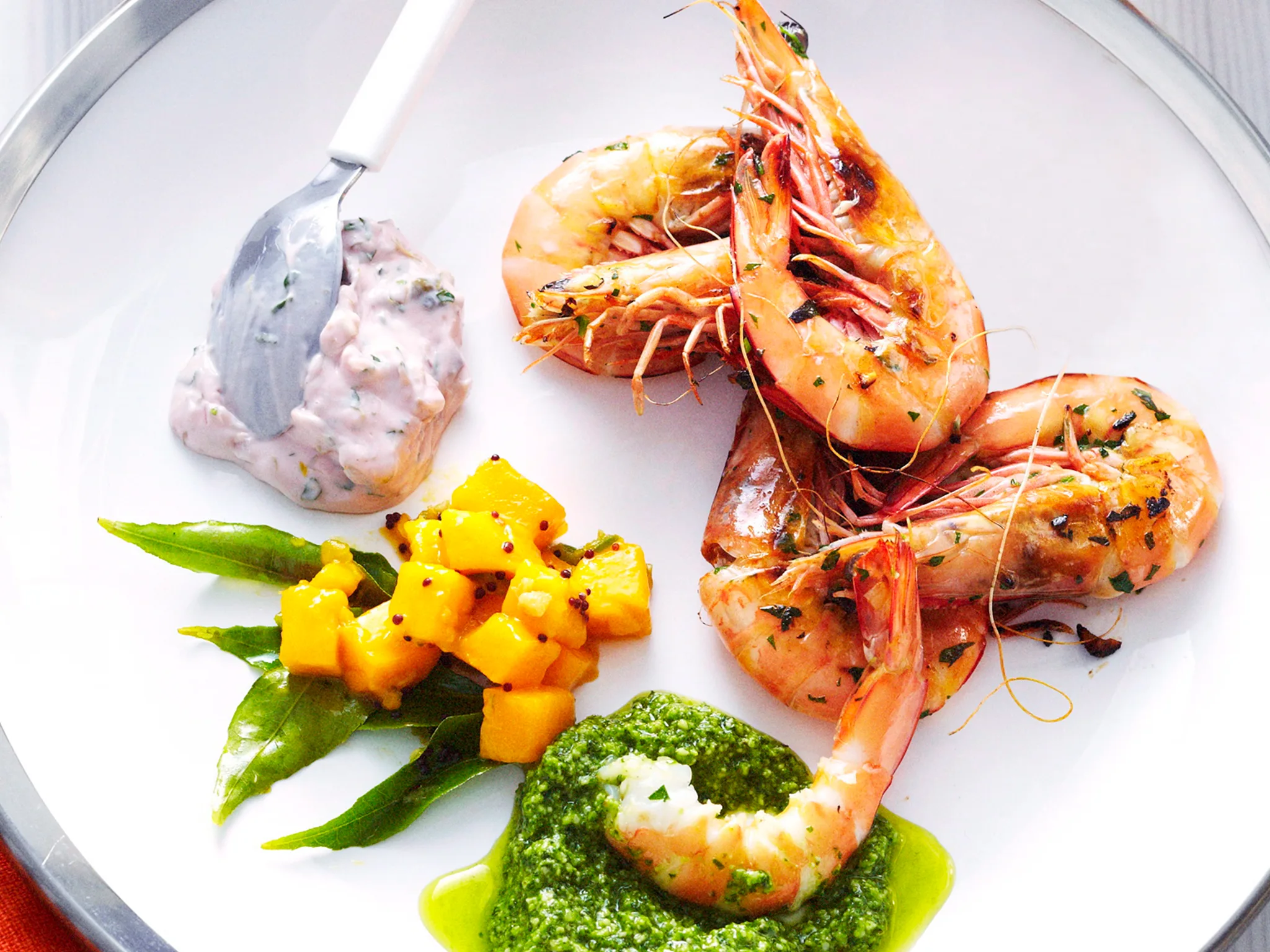 Grilled prawns with three sauces