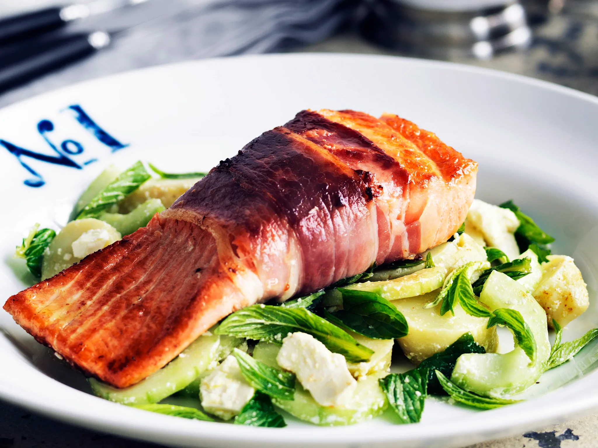 Pan-fried ocean trout with cucumber, mint and fetta salad