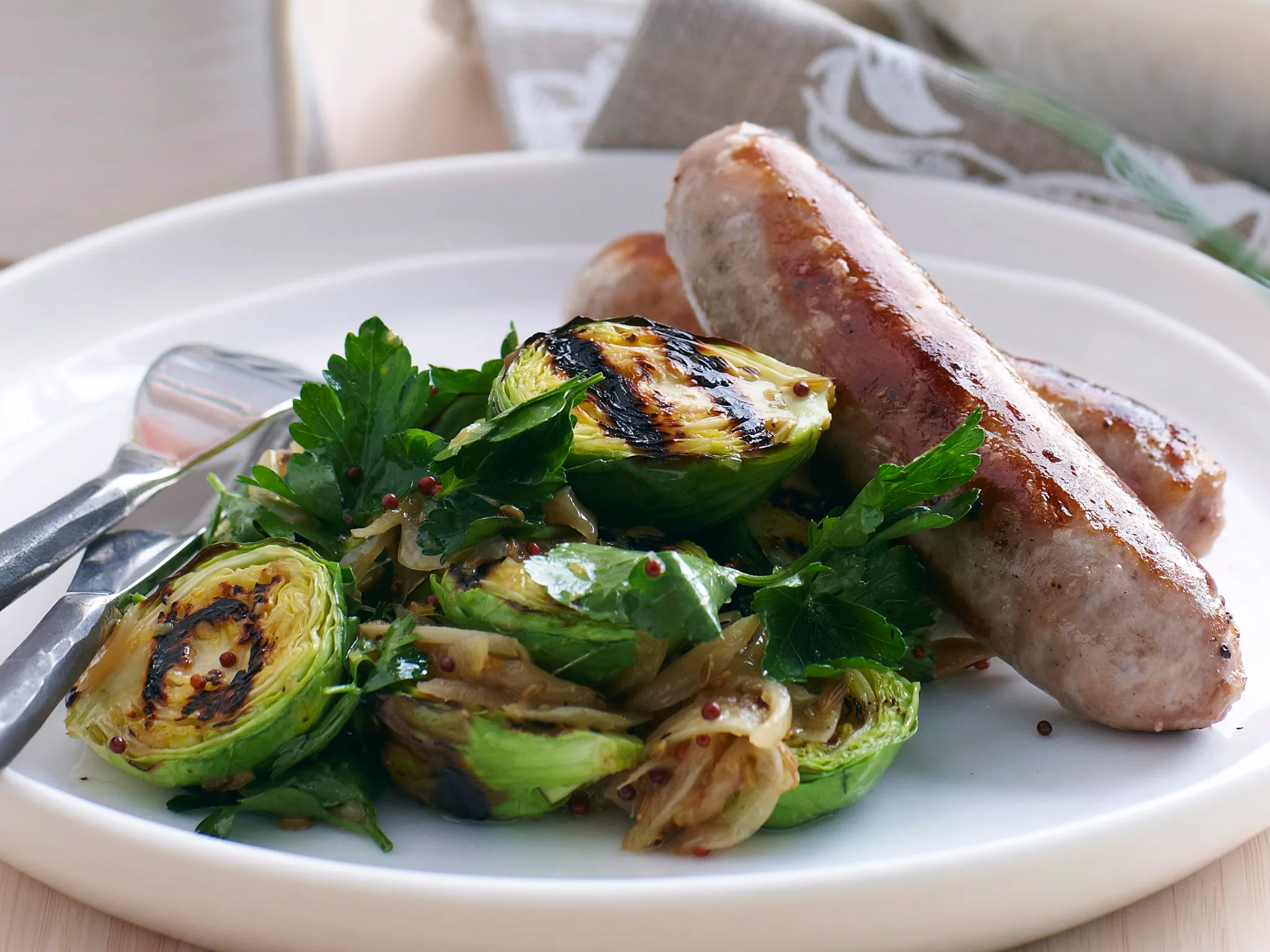 Pork and fennel sausages with brussels sprouts