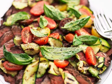 Seared beef with zucchini, tomatoes and basil